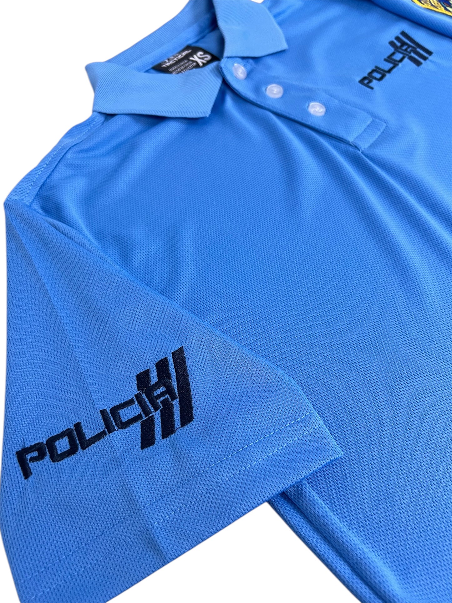 Polo 7.14 Policía Azul Claro M/C